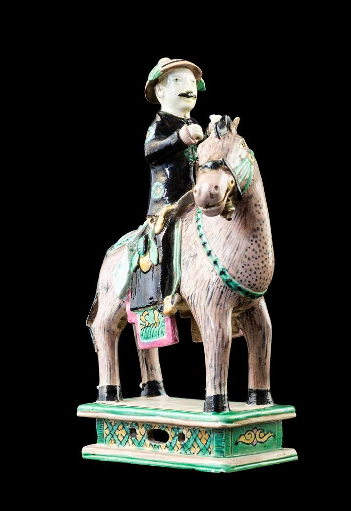 GG: Chinese biscuit porcelain model of a horse and rider